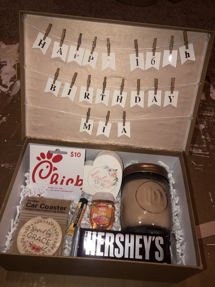 a birthday gift box filled with lots of goodies