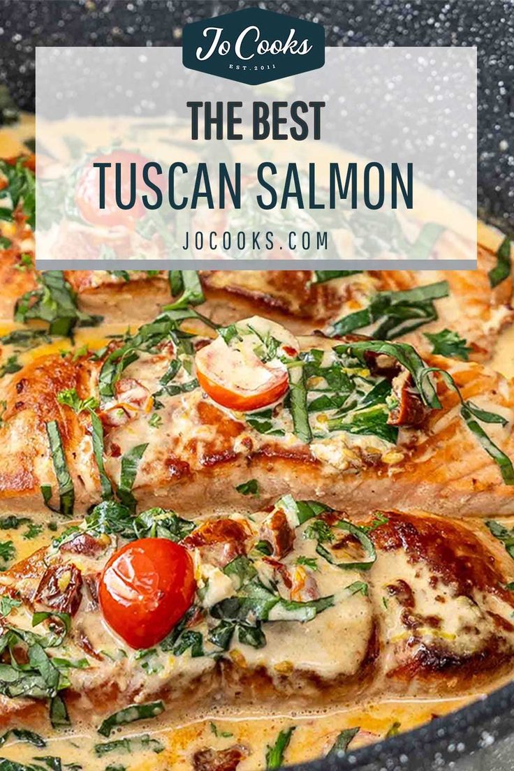 the best tuscann salmon recipe with tomatoes and spinach on top in a skillet