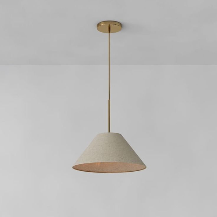 a light fixture hanging from the ceiling in a room with white walls and flooring