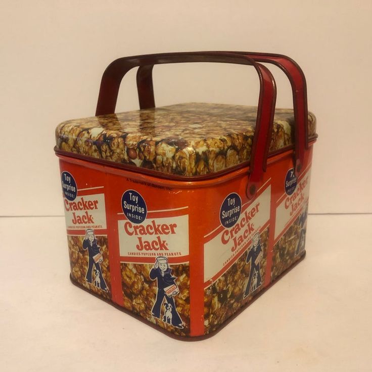 an old fashioned cracker jack lunch box