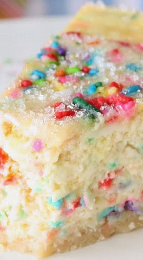 a piece of cake with sprinkles on it