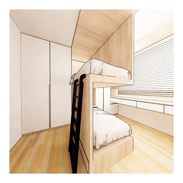 a bunk bed in a room with white walls and wood flooring on the side