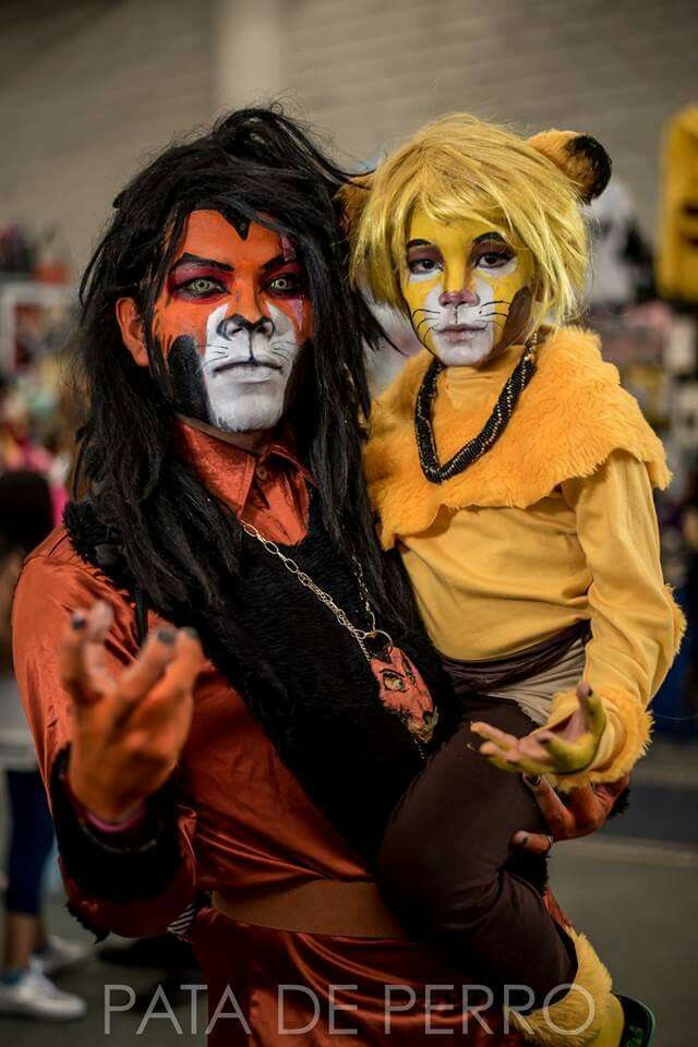 two people with face paint on their faces