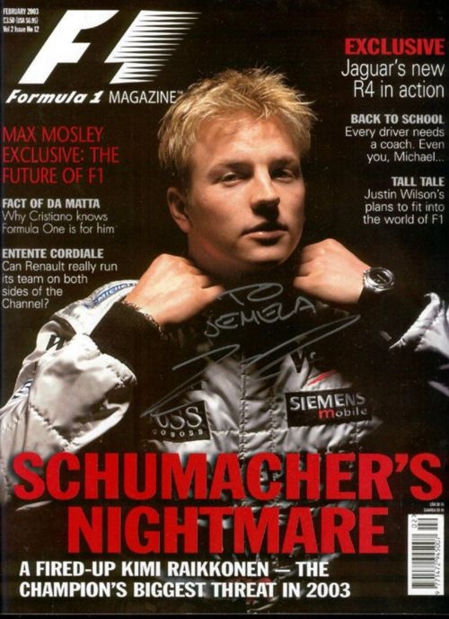 a magazine cover with a man wearing a racing suit on it's front page