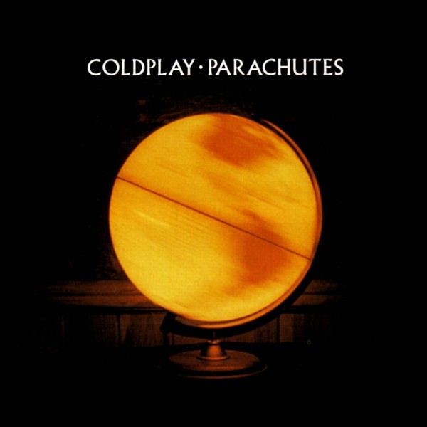 a yellow globe with the words coldplay parachutes on it's front cover