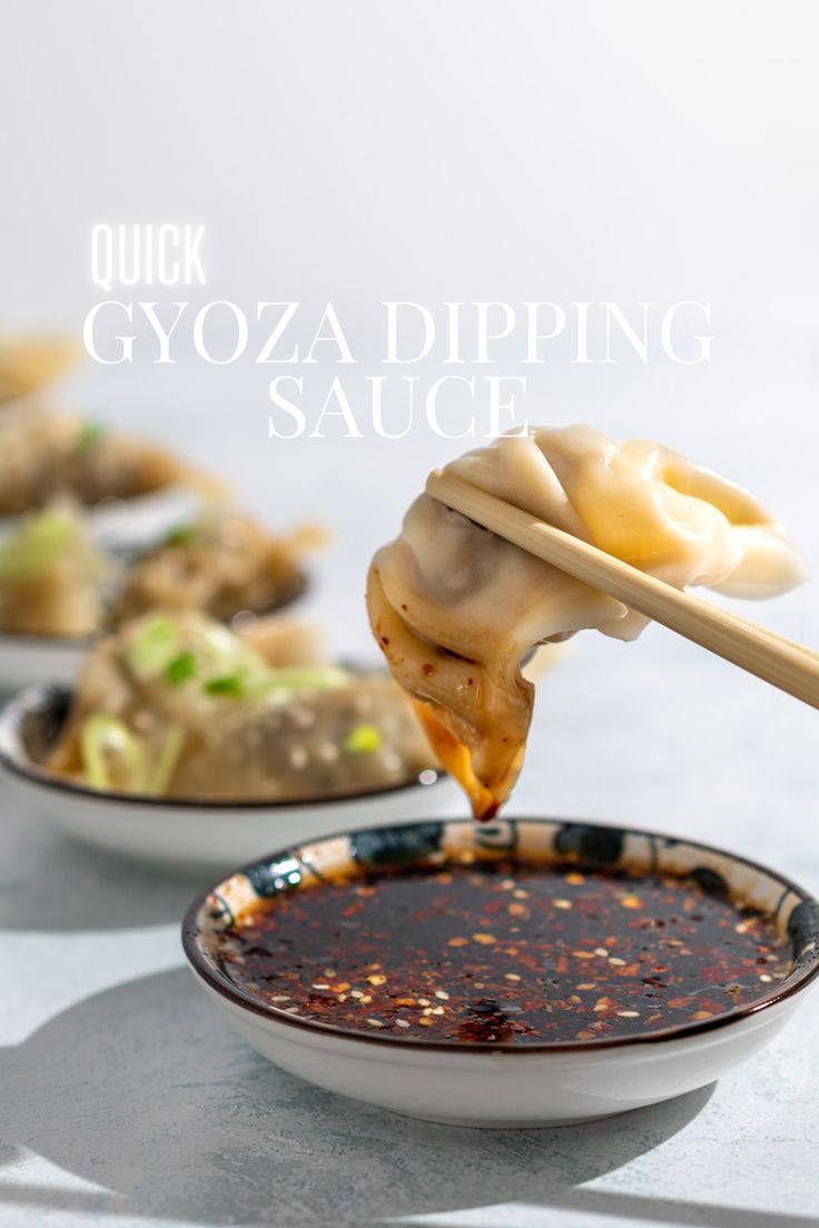 Gyoza sauce in a bowl with a Goyza dumpling being dipped into it. Sauce For Potstickers, Japanese Dipping Sauce, Gyoza Sauce Recipe, Gyoza Dipping Sauce, Gyoza Sauce, Meat And Cheese Platter, Japanese Gyoza, Gyoza Dumplings, Dumpling Dipping Sauce