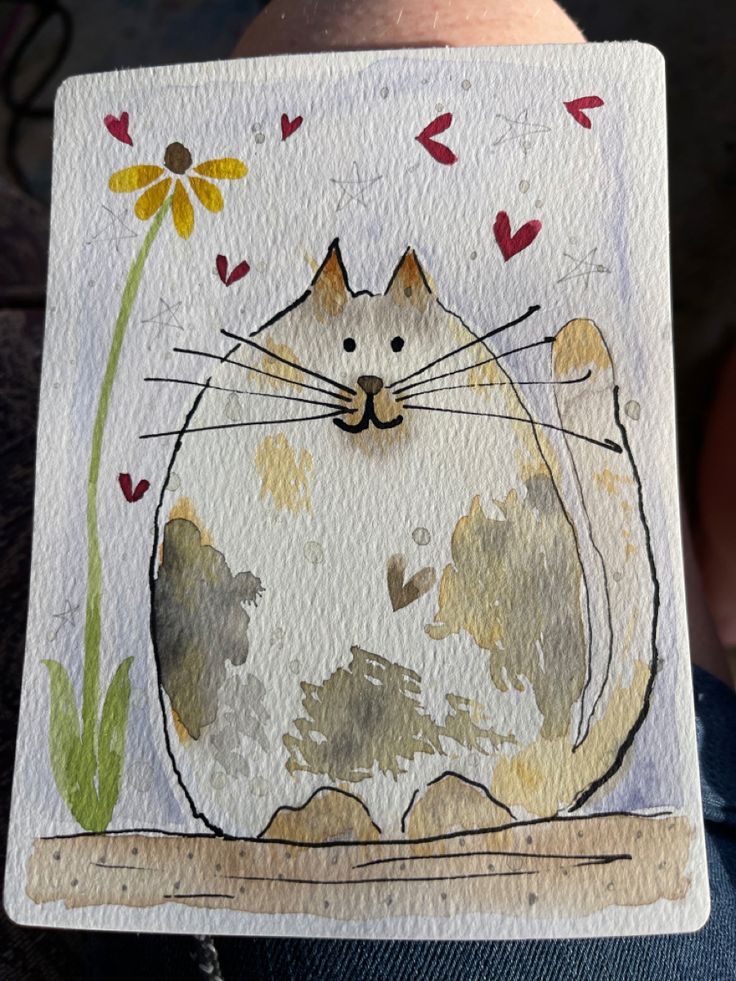 a drawing of a cat with flowers on it's face and the caption says, i love you