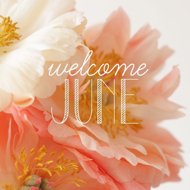 a bouquet of flowers with the words welcome june written in white and pink on it