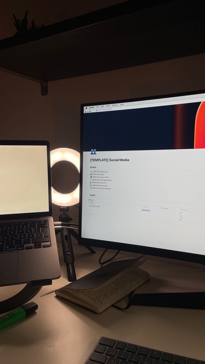 a computer monitor sitting on top of a desk next to a keyboard and mouse,