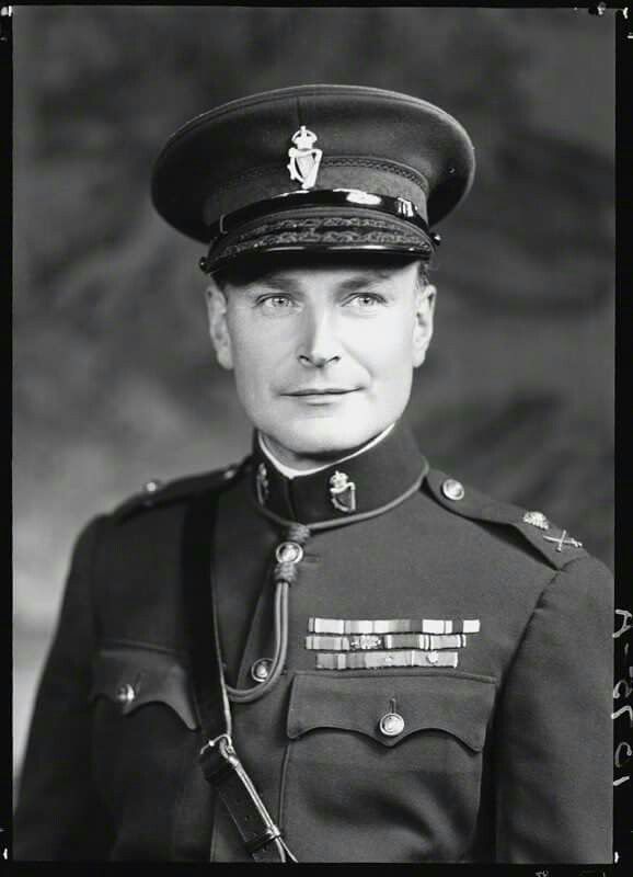 an old photo of a man in uniform