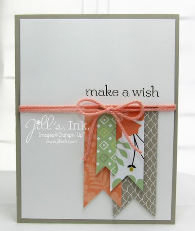 a close up of a card with a ribbon on it