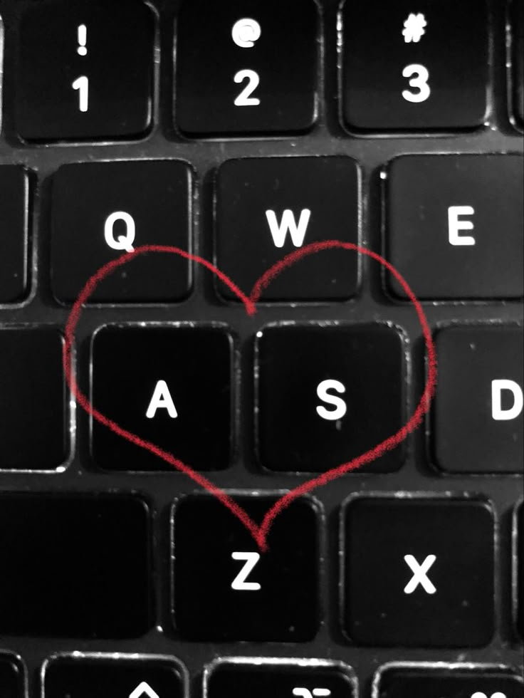 a keyboard with a heart drawn on it