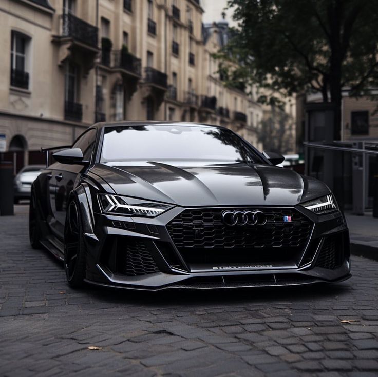 an audi sports car parked on the street