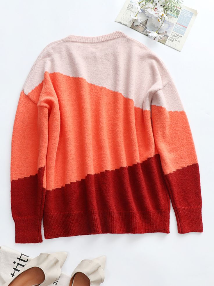 Our Elma knit jumper comes in a orange, beige & claret block print. It features a crew neckline and long relaxed sleeves for a comfortable, luxurious fit. This cute jumper is ideal for layering during the colder months. Size Guide: Melina is 5’6” tall, and has a 33.5” bust, 24.8”waist, & 37.4” hips. She is wearing a S / US 4 / AU 8. This jumper is true to size. Material: 52% acrylic / 28% polyamide / 20% polyester Key Features: Relaxed fit. Crew neckline. Long sleeves. Pull on style. Please note Trendy Orange Sweater For Layering, Cozy Color Block Crew Neck Sweater, Winter Color Block Crew Neck Sweater, Trendy Orange Soft Knit Sweater, Orange Color Block Long Sleeve Sweater, Orange Color Block Crew Neck Sweater, Orange Sweater For Layering In Fall, Orange Sweater For Fall Layering, Fall Crew Neck Sweater With Color Matching