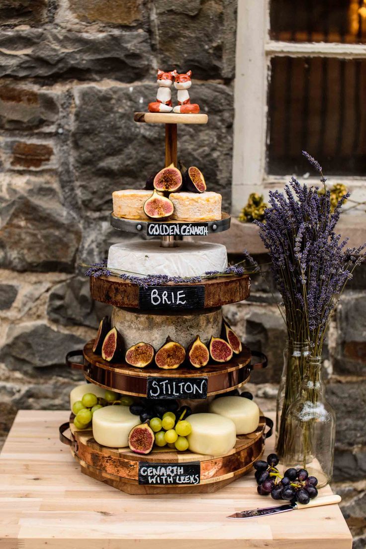 a cake made out of cheese and figurines