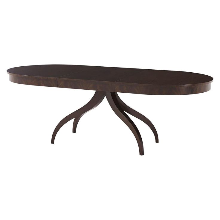 an oval dining table with two leaves on the legs and a wooden top, against a white background