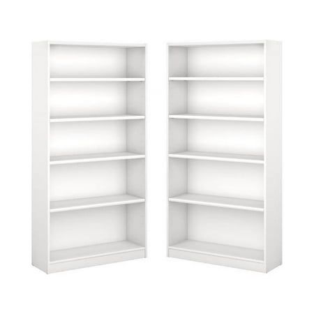 two white bookcases with open doors on each side and one closed door in the middle