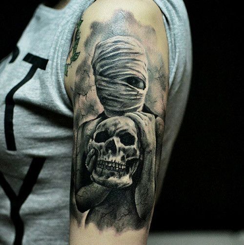 a woman with a skull tattoo on her arm