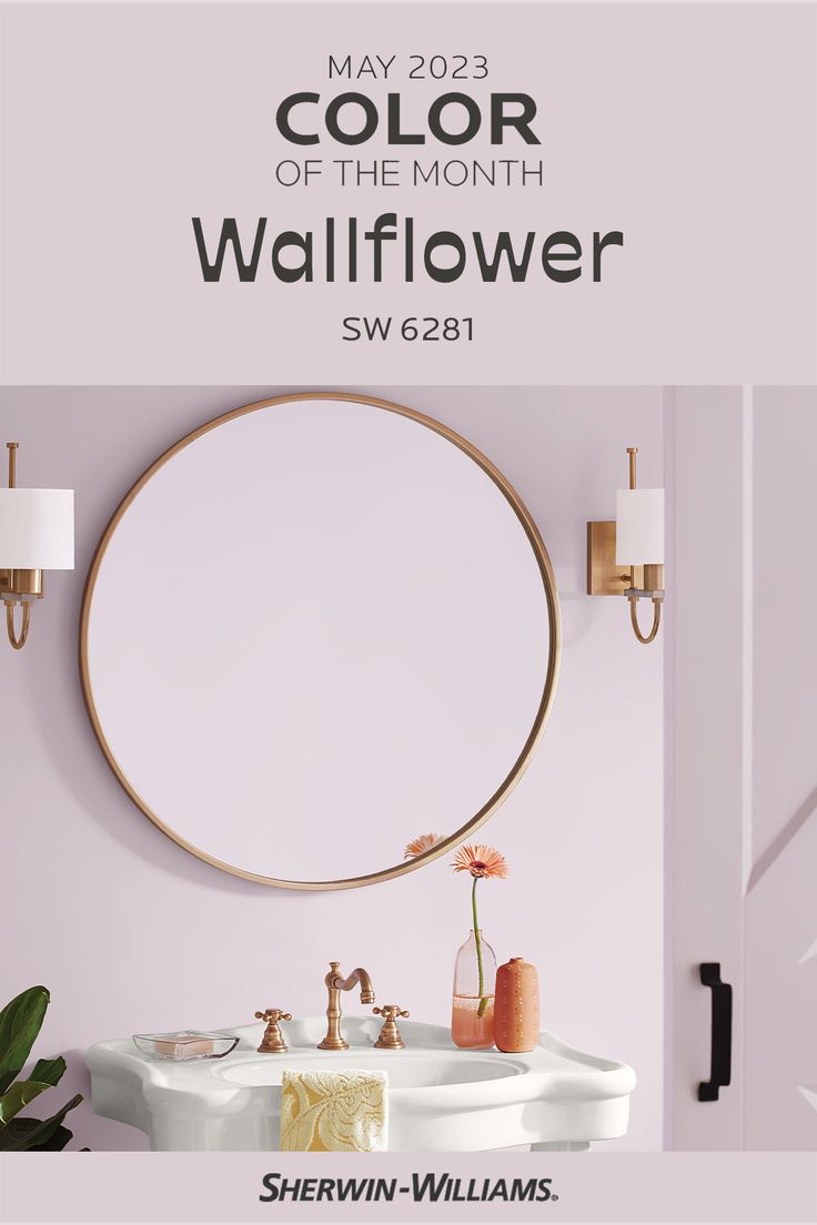 the color of the month wallflower is shown in this bathroom with pink walls and gold fixtures