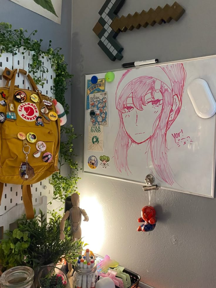 there is a drawing on the wall next to a purse