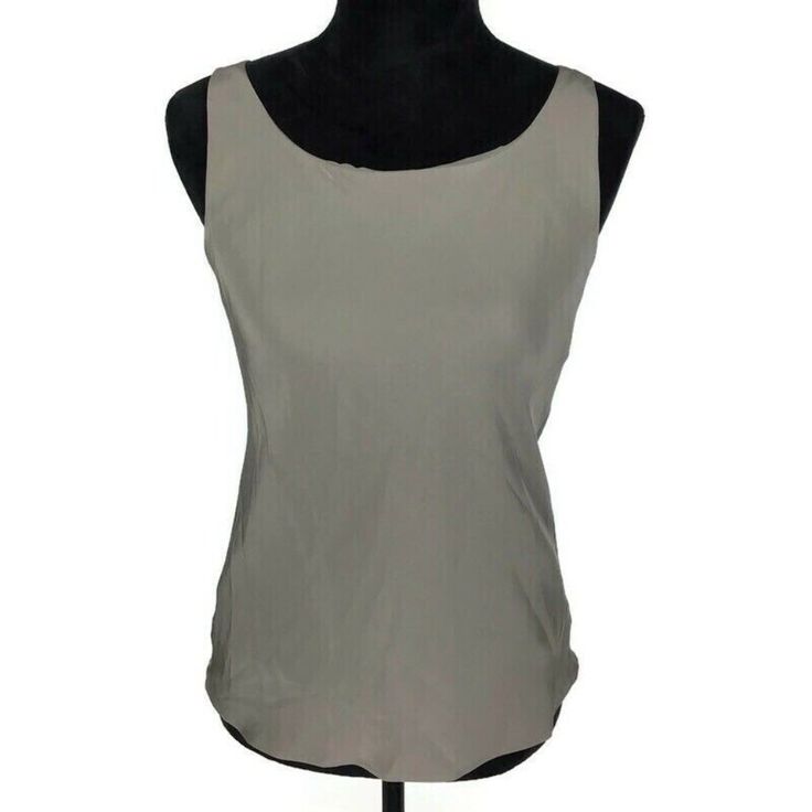 Lafayette 148 Silk Lined Sleeveless Taupe Blouse Size 2 Georgette Tank Nwt $268 Size: 2 Materials: 100% Silk Color: Taupe Measurements: 17" Across Chest, 16.5" Waist Across, 24" Length **To Get A Better Idea Of The Fit, Please Compare These Measurements With A Similar Item(S) You Already Own.** Condition New With Tags. See Measurements For Fit. 7s Sleeveless Stretch Blouse For Layering, Silk Sleeveless Tank Top For Spring, Fitted Cami Blouse For Daywear, Stretch Sleeveless Camisole For Daywear, Sleeveless Silk Tops For Summer, Fitted Silk Tank Top For Work, Scoop Neck Tank Top For Summer Workwear, Summer Sleeveless Camisole For Workwear, Elegant Summer Blouse With Scoop Neck