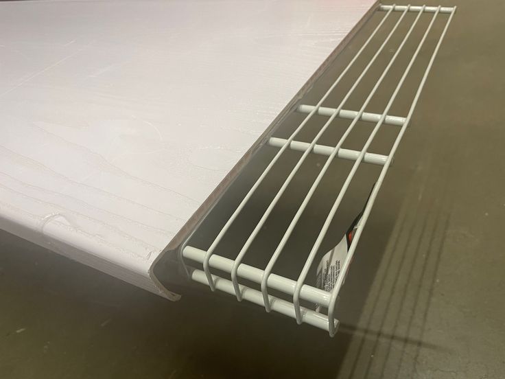 there is a mattress that has been placed on the floor with bars attached to it