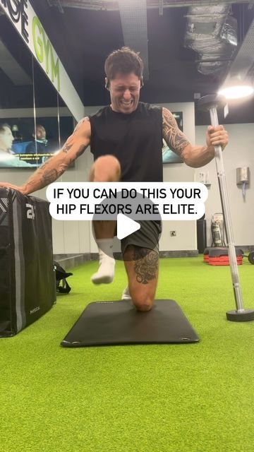 a man is doing exercises on a mat with a baseball bat in his hand and the caption reads if you can do this your hip flexors are elite