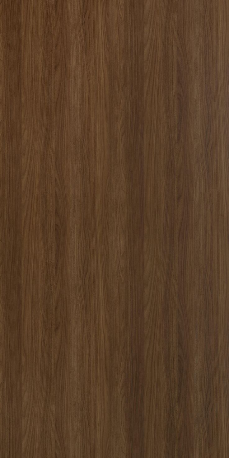 a close up view of the wood grain pattern on this wallpapered surface, which is very dark brown