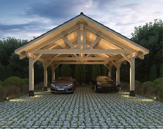 two cars are parked under a wooden covered structure in the middle of a garden area