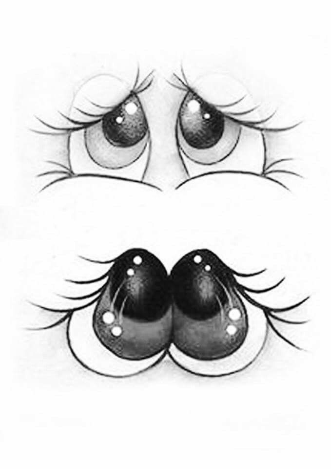 a drawing of an eye with long eyelashes and two balls on the bottom of it