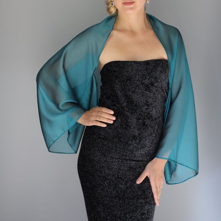 A very elegant chiffon sleeves wrap for your wedding party or evening dress. Made of soft chiffon, very comfortable and easy to wear. Color: teal blue green ( other colors are available ) Size : unique / fits all You can use it as a wrap, shawl or stola. WE have matching bags in our Etsy Shop! WE accept credit cards! Elegant Fitted Summer Shrug, Fitted Shawl For Summer Party, Elegant Shawl For Summer Parties, Fitted Shawl Dress For Party, Elegant Blue Shawl For Spring, Fitted Evening Shawl, Fitted Wedding Shawl Wrap, Fitted Shawl For Mother Of The Bride, Elegant Spring Wrap Shrug