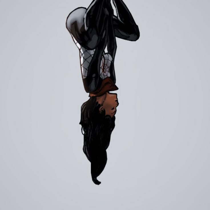 a woman is upside down in the air