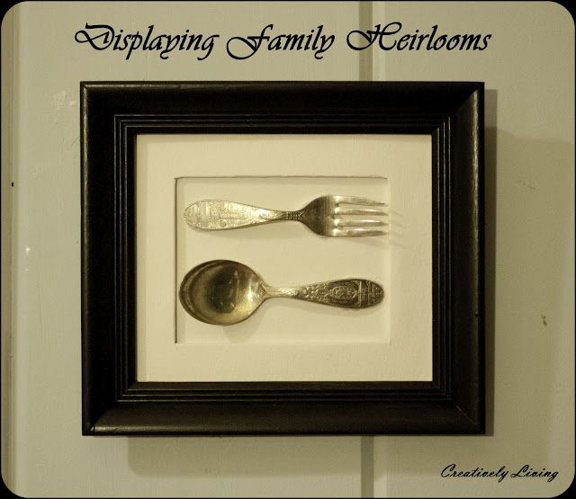 two forks and spoons are in a shadow box with the caption explaining family customs