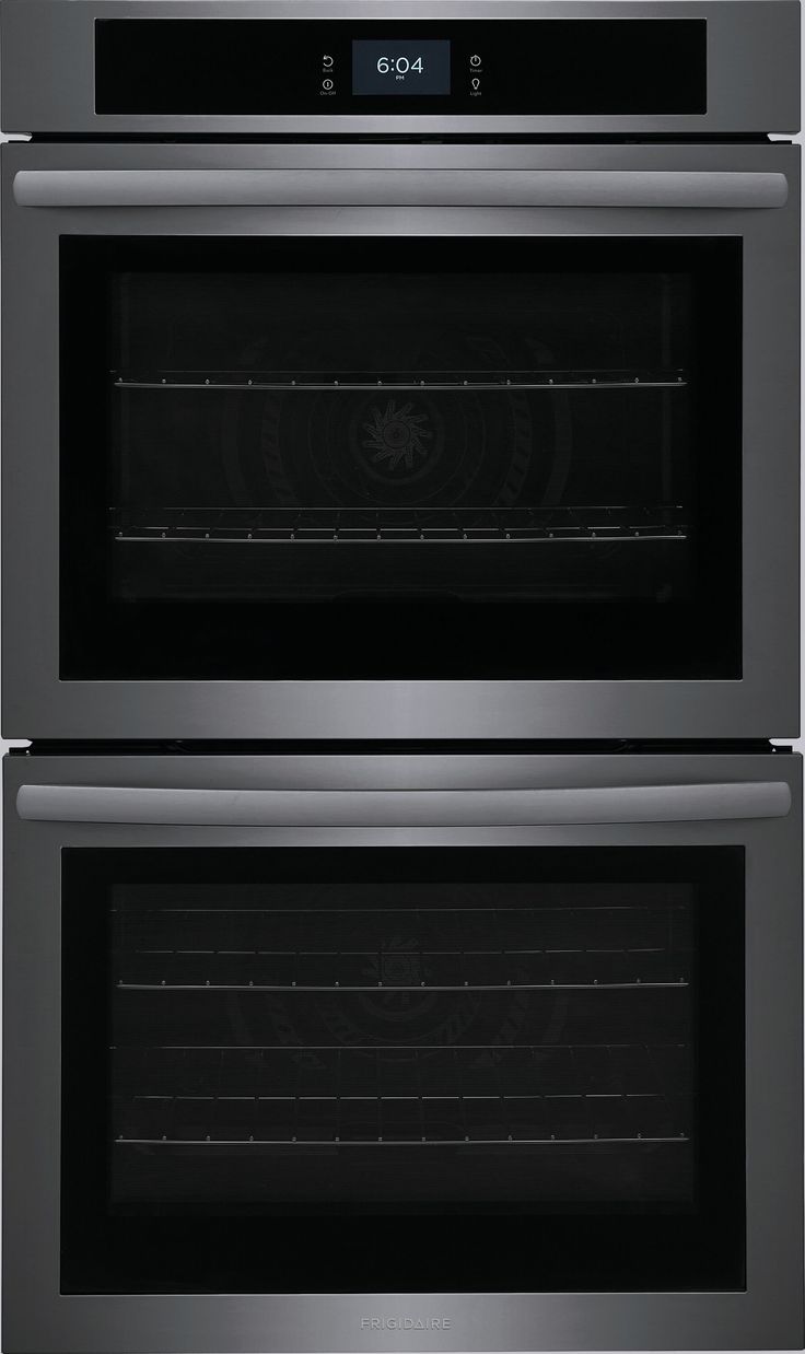 two double ovens side by side with the door open and one on each side