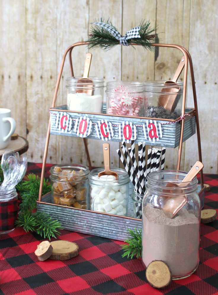 an image of a table with food and drink items on it, including marshmallows