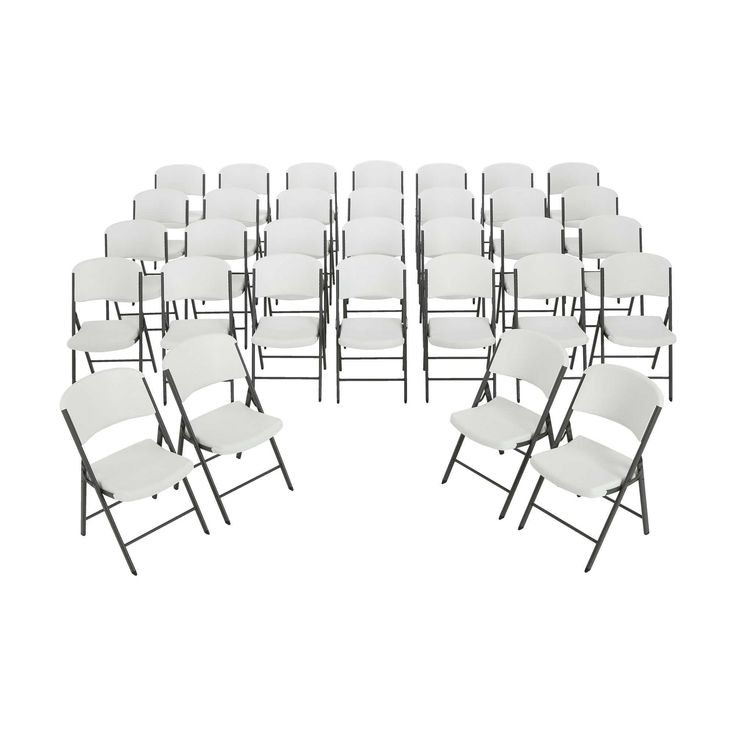 a large group of white chairs sitting next to each other on top of a white floor