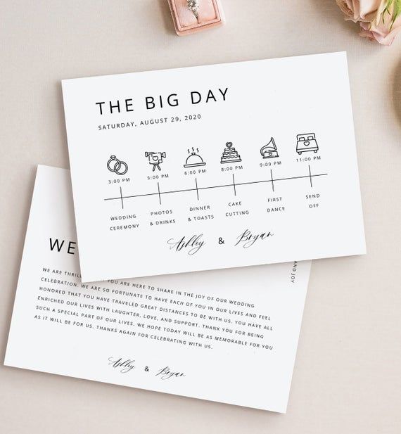 the big day wedding stationery is laid out on top of each other next to some flowers