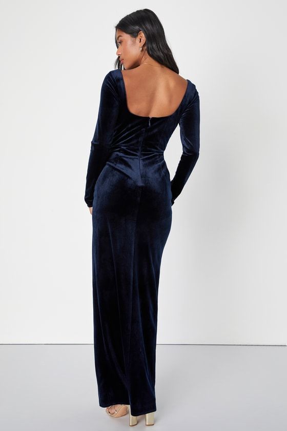 You'll always look like your most elegant self when you slip into the Lulus Forever Sensational Navy Blue Velvet Long Sleeve Maxi Dress! Stretchy, luxe velvet shapes this dreamy dress that features a princess-seamed bodice, a flirty sweetheart neckline, and long sleeves. The high, fitted waist tops a figure-skimming skirt with a tulip-style silhouette that gathers at the side and falls to a sweeping maxi hem. Hidden back zipper/clasp. Fit: This garment fits true to size. Length: Floor length. Size medium measures 59.5" from shoulder to hem. Bust: Great for any cup size. Waist: Fitted - very fitted at natural waist. Hip: Fitted - stretchy fabric allows room for hips. Undergarments: May be worn with a strapless bra, adhesive bra, petals, or no bra. Fabric: Fabric is very stretchy. Lined. She Fitted Bodice Velvet Dress For Gala, Velvet Dress With Fitted Bodice For Gala, Velvet Gala Dress With Fitted Bodice, Fitted Glamorous Velvet Gown, Glamorous Fitted Velvet Gown, Elegant Long Sleeve Velvet Gala Dress, Formal Velvet Gown With Fitted Bodice, Velvet Long Sleeve Dress For Gala, Glamorous Velvet Dress For Formal Occasions