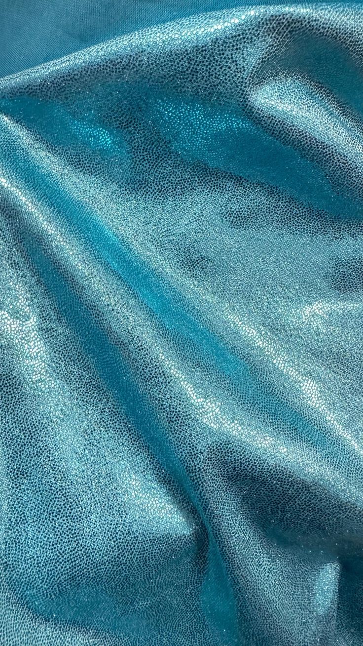 a close up view of a blue fabric