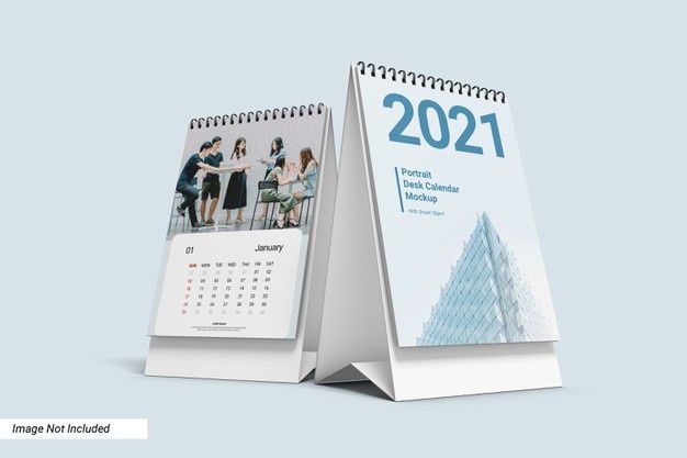 a desk calendar with two people standing in front of it and the cover is open