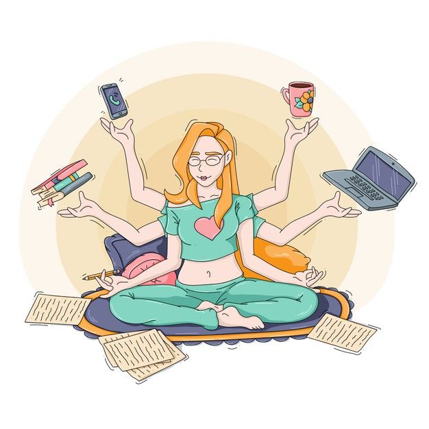 a woman sitting in the middle of a yoga pose with her laptop and other items