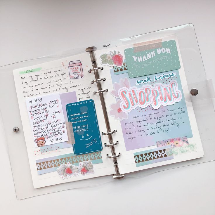 an open planner book with writing on it