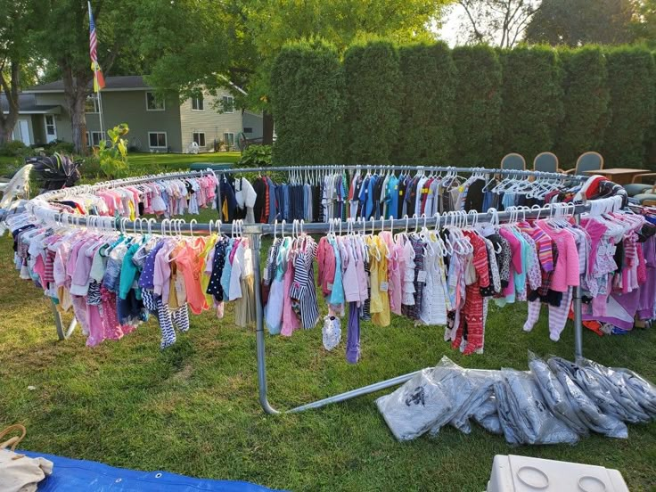 clothes are hung up in the yard to dry