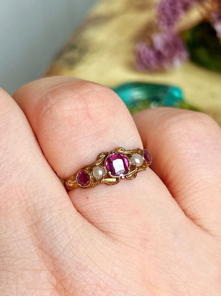 A delicate antique Victorian ring featuring 3 garnets and pearls. A beautiful vibrant pink shade makes this ring unique and perfect to brighten up your hands. DETAILS: Dimensions: 6.5US size - 1.23gr Hallmark: hallmarked for Birmingham 1864, 12ct gold Condition: Excellent All the items are carefully packaged with upcycled materials and ready to be gifted! Friendly layaway plans are always possible! Please DM for the details. You can message me in English, Italian or French! Thank you for visitin Antique Engagement Rings Unique, Pearl And Garnet Ring, Antique Rings Gold, Baroque Ring, Antique Engagement Rings Victorian, Victorian Wedding Ring, Victorian Gold Ring, Victorian Engagement Ring, Pearls Ring