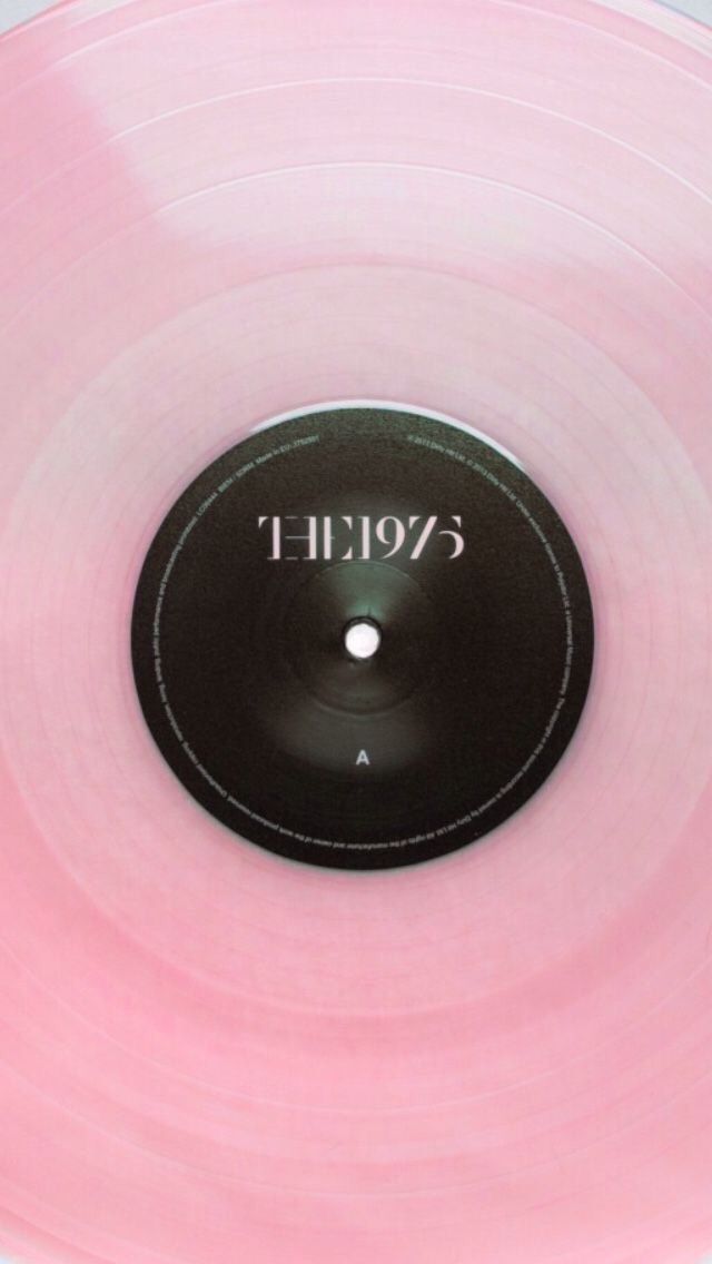 a pink vinyl record with the word evolit on it's center circle