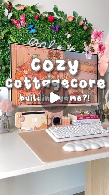 a computer screen with the words cozy cottage on it, sitting next to a keyboard and mouse