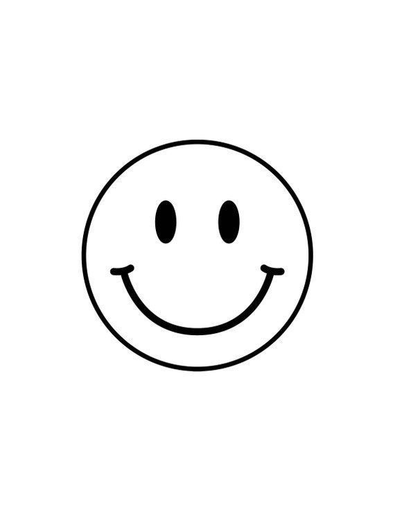 a black and white drawing of a smiley face