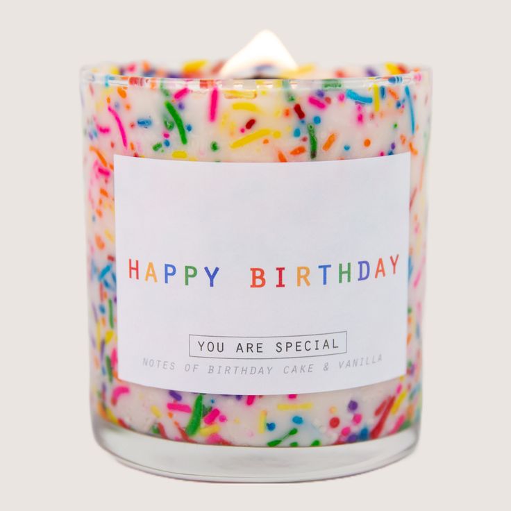 a birthday candle with sprinkles on it and a card that says, you are special