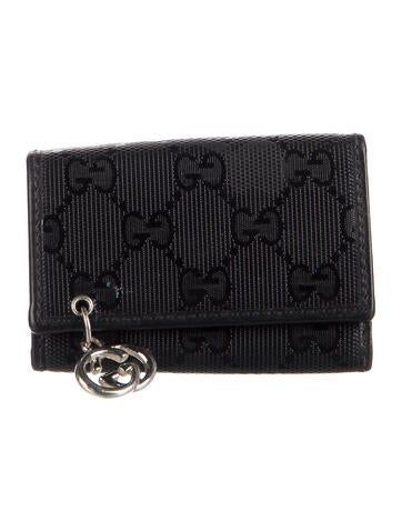 Gucci Black Guccissima Key Holder Gucci Key Wallet, Key Ring Gucci, Luxury Black Coin Purse With Interior Key Chain Holder, Gucci Key Case, Gucci Black Wallet With Card Slots, Gucci Black Bag With Gold-tone Hardware, Jordan Jewelry, Loewe Bag, Chrome Hearts