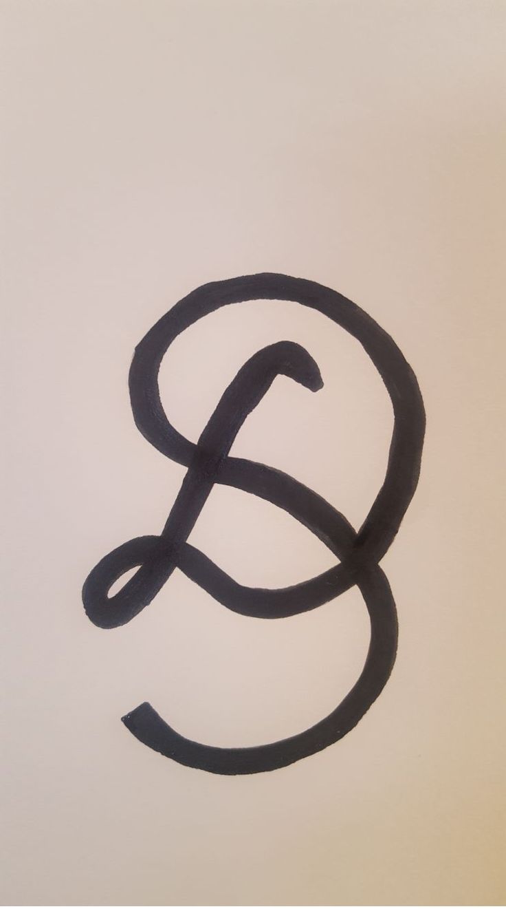 the letter g is drawn in black ink on a white paper with an oval shape